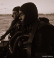   Almost Underwater Royal Australian Navy Clearance Divers Maritime Tactical Operationspreparing night excercises wearing LAR oxygen rebreathers clandestine wetsuits. Photographed using Nikon F4 50mm lens Kodak Ektachrome 100ASA. Underwater'- Underwater' wetsuits 100ASA  